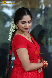 Telugu actress Karunya Chowdary beautiful in a red saree