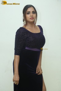 telugu actress Karunya Chowdary tempting photo shoot in a slit dress