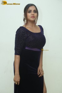 telugu actress Karunya Chowdary tempting photo shoot in a slit dress