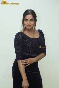 telugu actress Karunya Chowdary tempting photo shoot in a slit dress