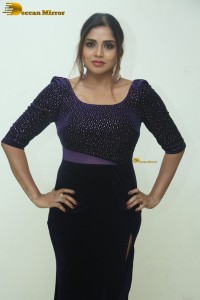 telugu actress Karunya Chowdary tempting photo shoot in a slit dress