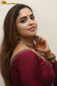 telugu actress Karunya Chowdary pretty in a red saree