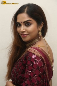 telugu actress Karunya Chowdary pretty in a red saree