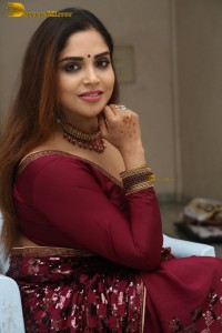 telugu actress Karunya Chowdary pretty in a red saree