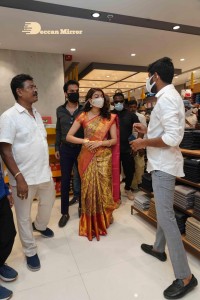 Actress Kajal Aggarwal with her husband Gautam Kitchlu launching Kasam Pullaiah Wedding Mall in Warangal