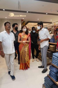 Actress Kajal Aggarwal with her husband Gautam Kitchlu launching Kasam Pullaiah Wedding Mall in Warangal