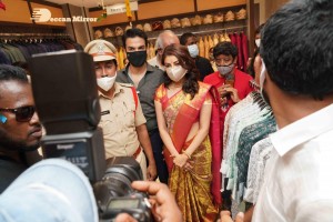 Actress Kajal Aggarwal with her husband Gautam Kitchlu launching Kasam Pullaiah Wedding Mall in Warangal