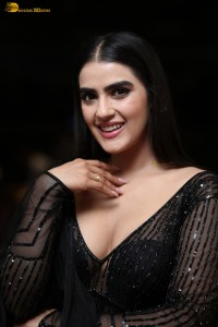 actress Kavya Thapar beautiful in a low neck black dress