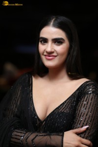 actress Kavya Thapar beautiful in a low neck black dress