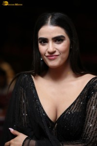 actress Kavya Thapar beautiful in a low neck black dress