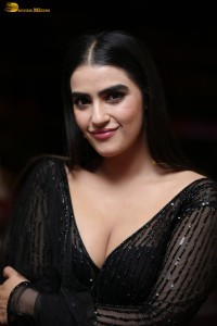 actress Kavya Thapar beautiful in a low neck black dress
