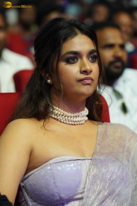 Keerthy Suresh glamorous looks in a sleeveless low neck blouse at a movie function