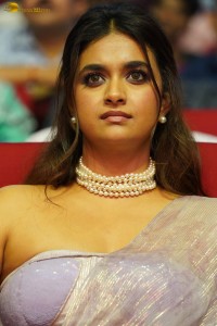 Keerthy Suresh glamorous looks in a sleeveless low neck blouse at a movie function
