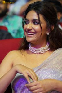 Keerthy Suresh glamorous looks in a sleeveless low neck blouse at a movie function