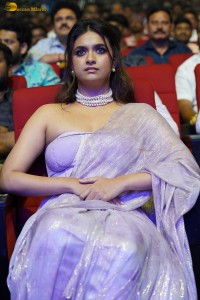 Keerthy Suresh glamorous looks in a sleeveless low neck blouse at a movie function