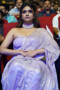 Keerthy Suresh glamorous looks in a sleeveless low neck blouse at a movie function