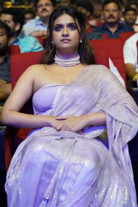 Keerthy Suresh glamorous looks in a sleeveless low neck blouse at a movie function