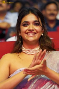 Keerthy Suresh glamorous looks in a sleeveless low neck blouse at a movie function