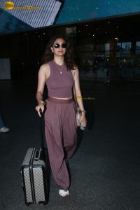 actress Keerthy Suresh in a stylish brown dress at mumbai airport