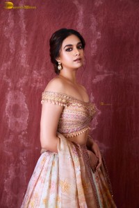 actress keerthy suresh hot looks in a shoulderless lehenga choli dress