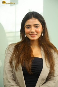 actress ketika sharma hot photoshoot in a grey coat over a shoulderless black dress