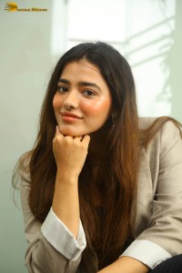 actress ketika sharma hot photoshoot in a grey coat over a shoulderless black dress