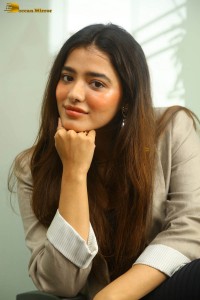 actress ketika sharma hot photoshoot in a grey coat over a shoulderless black dress