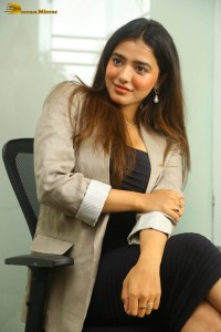 actress ketika sharma hot photoshoot in a grey coat over a shoulderless black dress