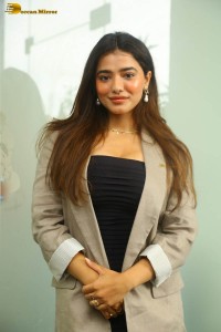 actress ketika sharma hot photoshoot in a grey coat over a shoulderless black dress