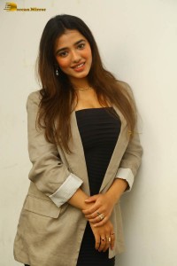 actress ketika sharma hot photoshoot in a grey coat over a shoulderless black dress
