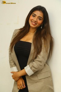 actress ketika sharma hot photoshoot in a grey coat over a shoulderless black dress