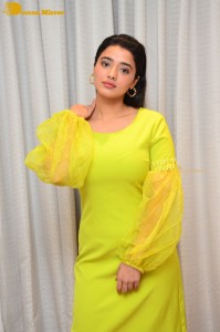 Actress Ketika Sharma pretty in a green dress