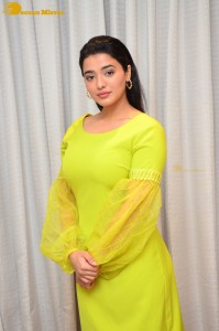 Actress Ketika Sharma pretty in a green dress