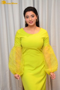 Actress Ketika Sharma pretty in a green dress