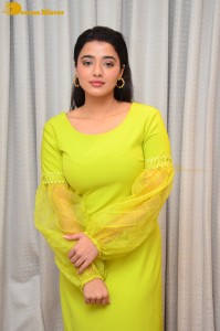 Actress Ketika Sharma pretty in a green dress