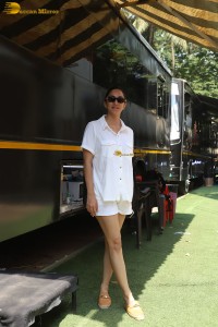 Bollywood actress Kiara Advani in white t-shirt and shorts