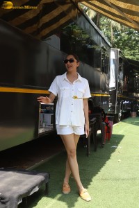 Bollywood actress Kiara Advani in white t-shirt and shorts