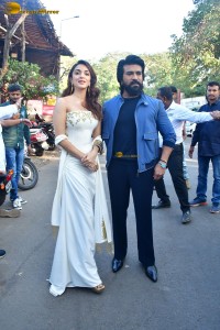 bollywood actress Kiara Advani poses with ram charan tej while promoting their film game changer