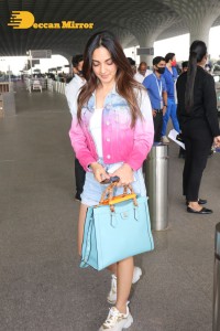 Kiara Advani in denim shorts at Mumbai Airport