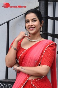 Komalee Prasad in a Red Half Saree posing for photoshoot