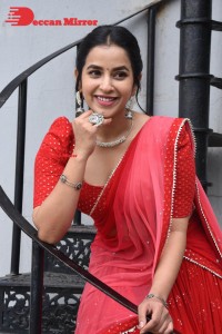 Komalee Prasad in a Red Half Saree posing for photoshoot