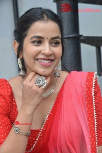 Komalee Prasad in a Red Half Saree posing for photoshoot