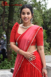 Komalee Prasad in a Red Half Saree posing for photoshoot