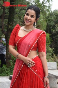 Komalee Prasad in a Red Half Saree posing for photoshoot