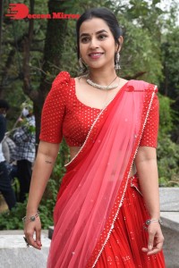 Komalee Prasad in a Red Half Saree posing for photoshoot