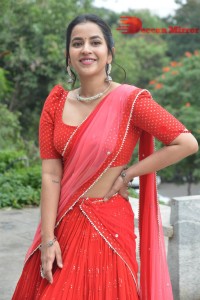 Komalee Prasad in a Red Half Saree posing for photoshoot