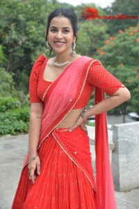 Komalee Prasad in a Red Half Saree posing for photoshoot