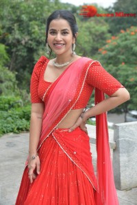 Komalee Prasad in a Red Half Saree posing for photoshoot