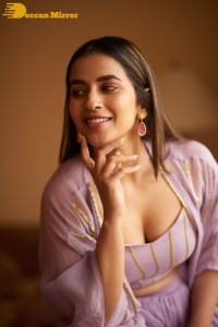 Komalee Prasad in a purple dress