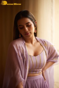 Komalee Prasad in a purple dress